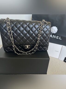 CHANEL Black Quilted Shoulder Bag with Silver-Tone Chain
